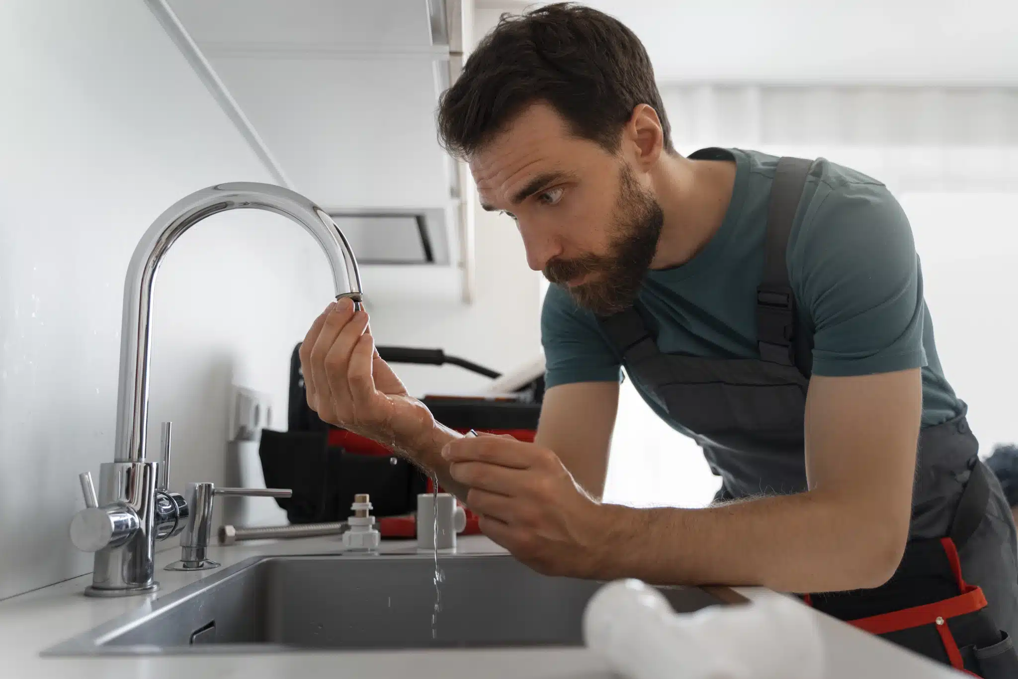 side-view-man-working-as-plumber-2048x1365.webp